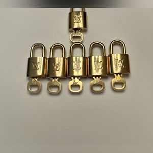 Authentic Louis Vuitton padlocks number ON CHOICE.